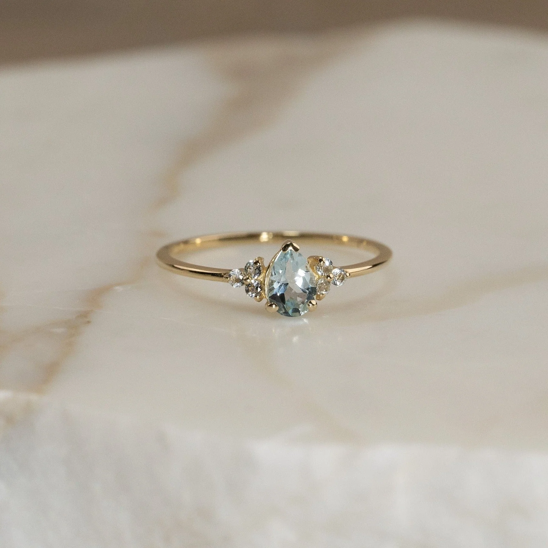 CASSANDRA BLUE TOPAZ SOLID GOLD RING