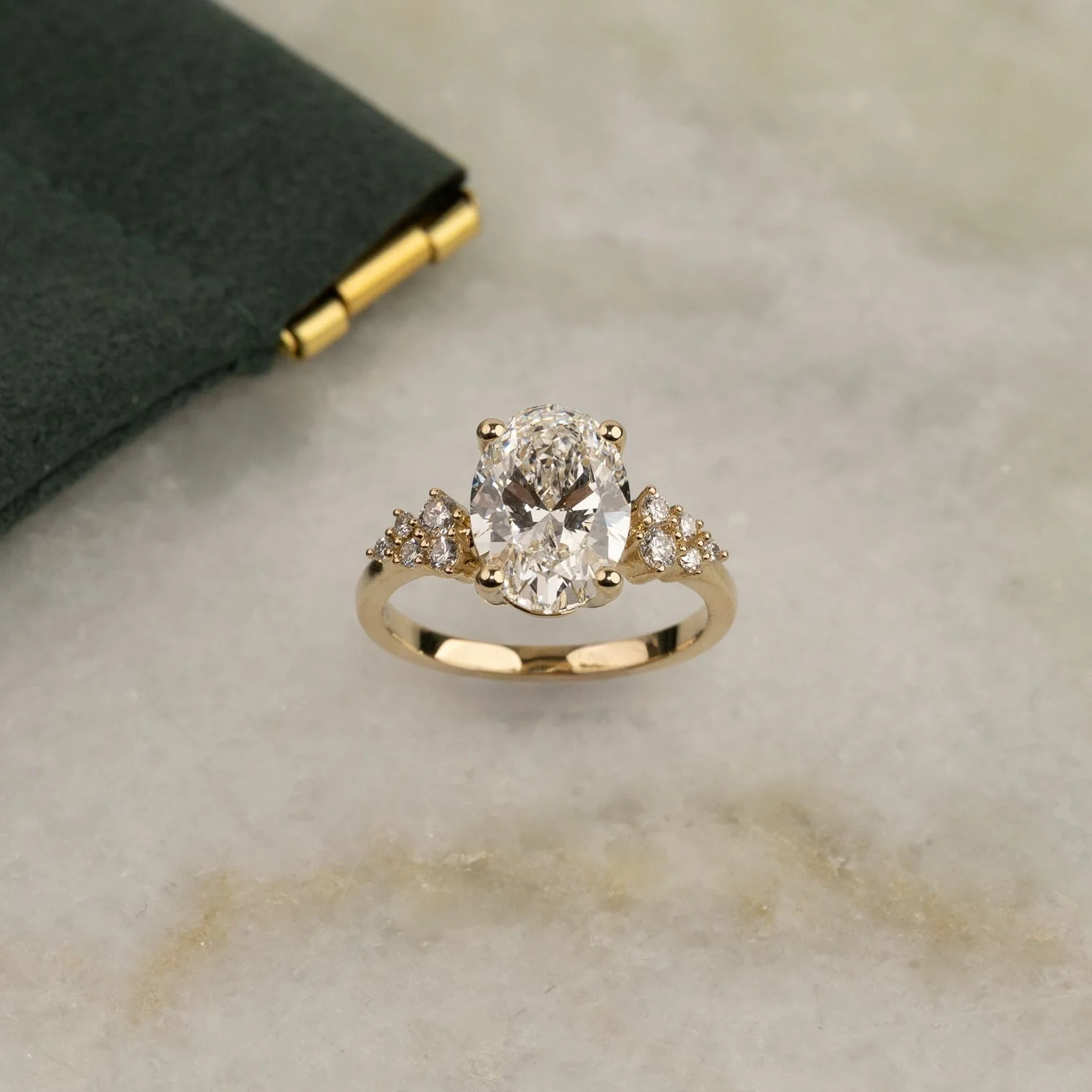 DELICATE CLUSTER OVAL-CUT DIAMOND RING - Image 2