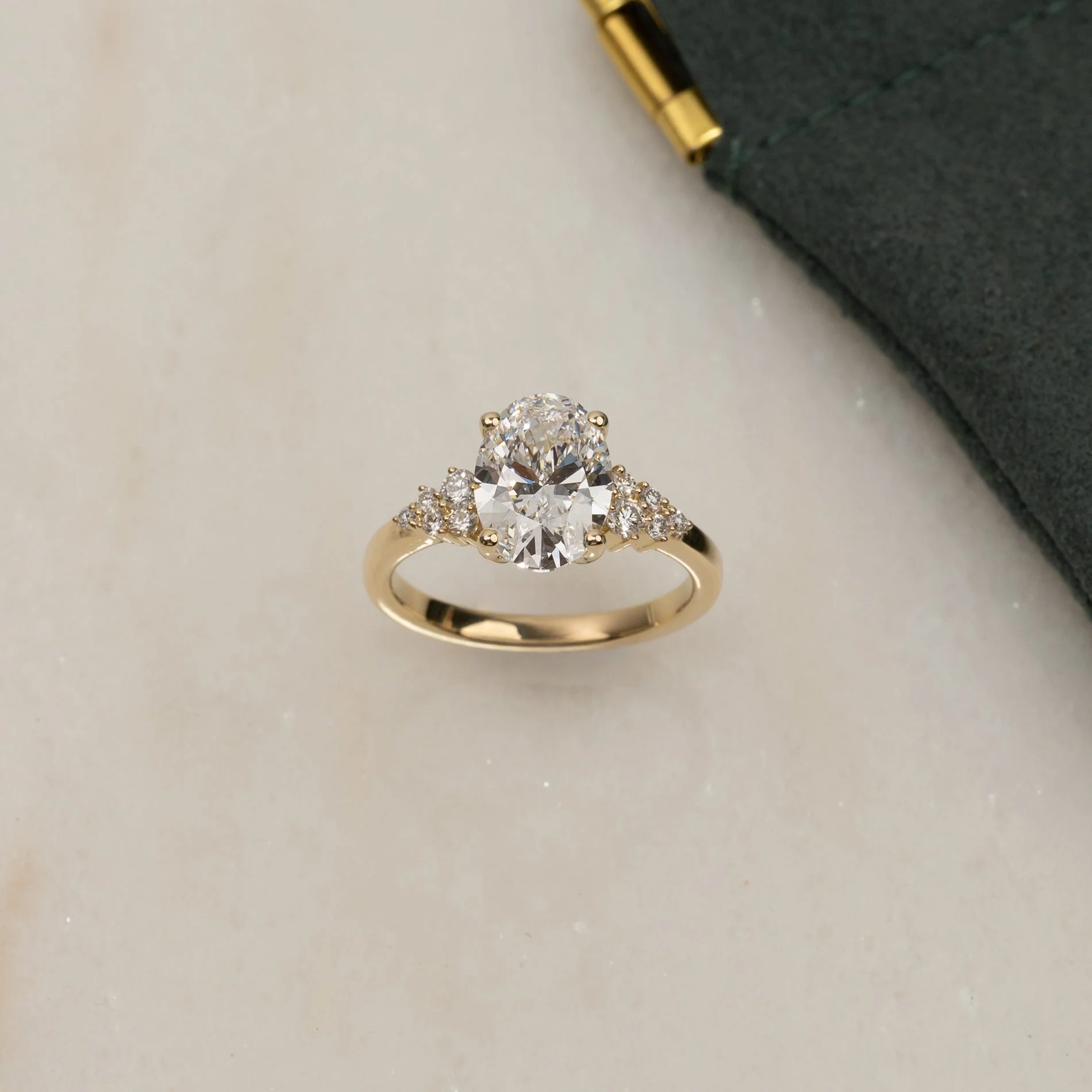 DELICATE CLUSTER OVAL-CUT DIAMOND RING - Image 8
