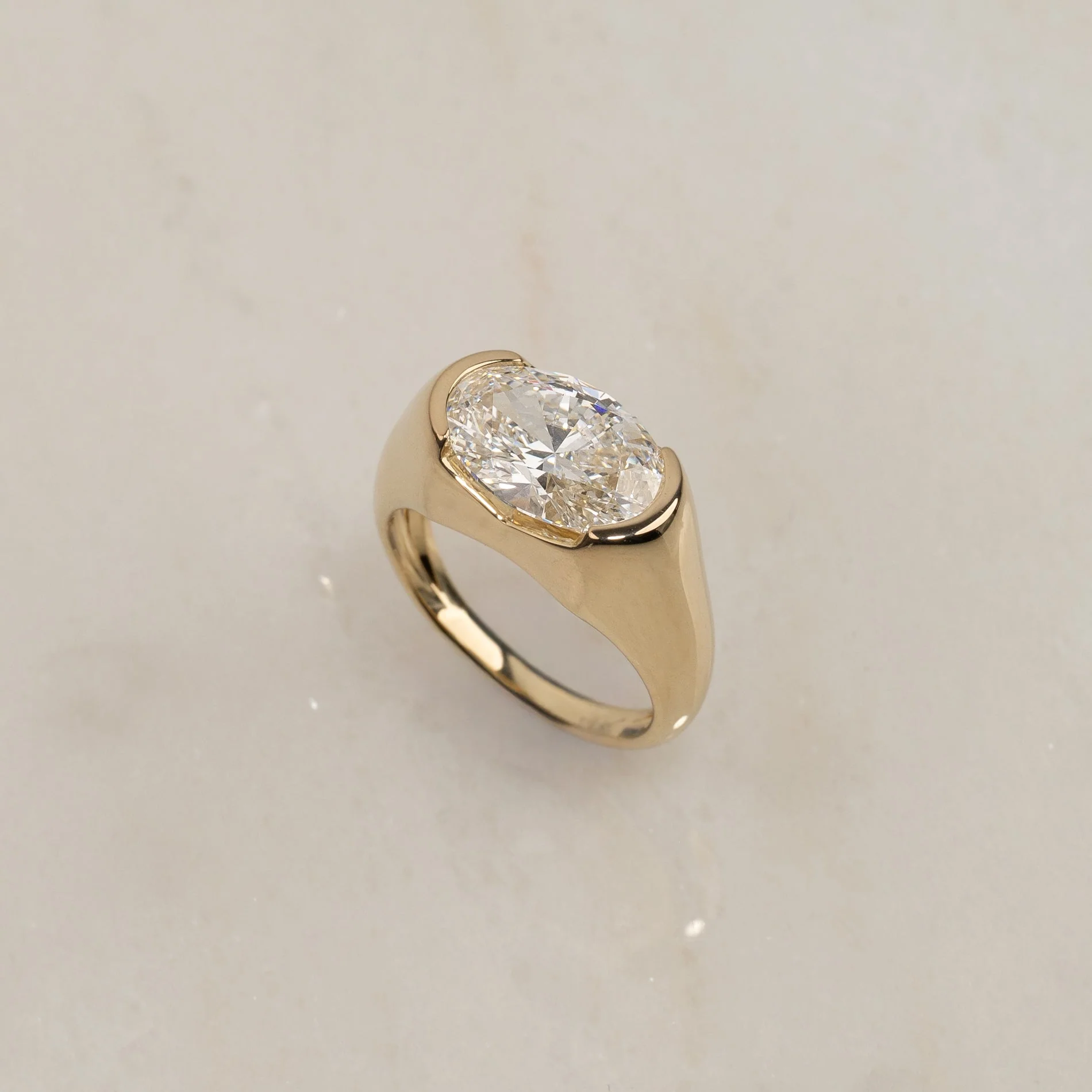 EAST TO WEST OVAL-CUT BEZEL-SET SIGNET LAB-DIAMOND RING - 3.5ct