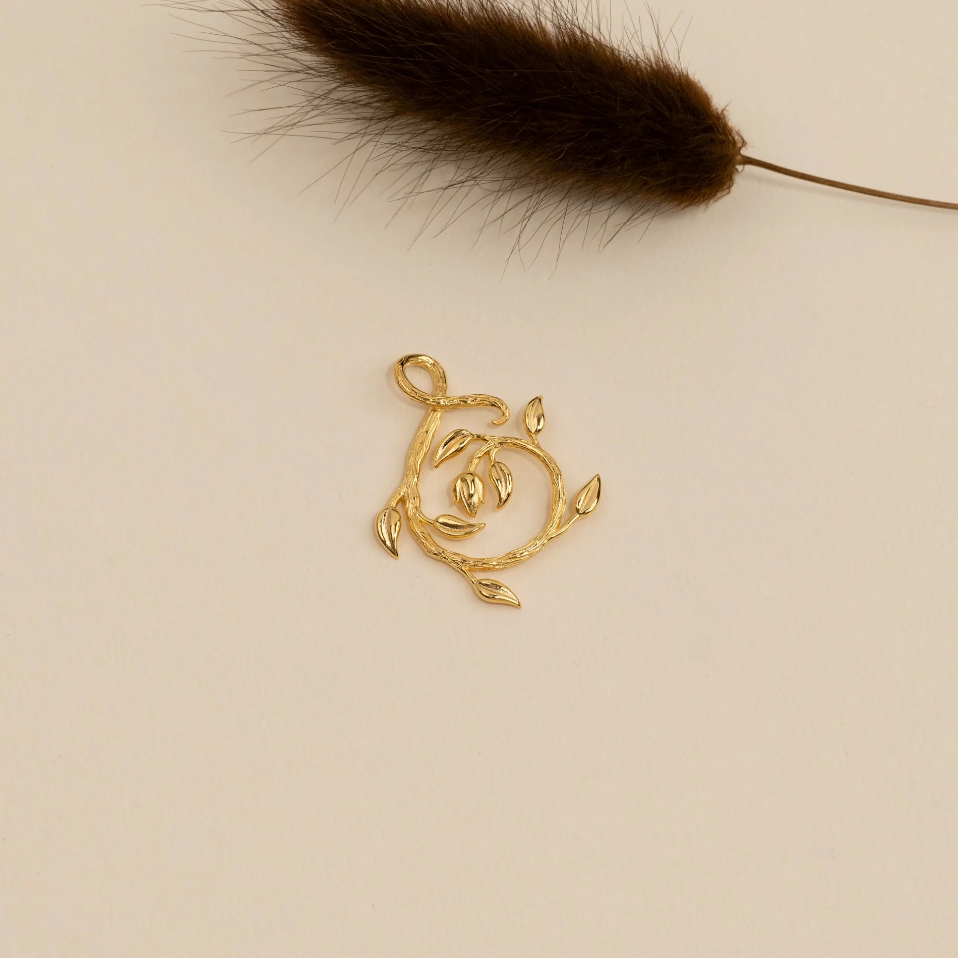 EDEN SWIRL GOLDEN PENDANT