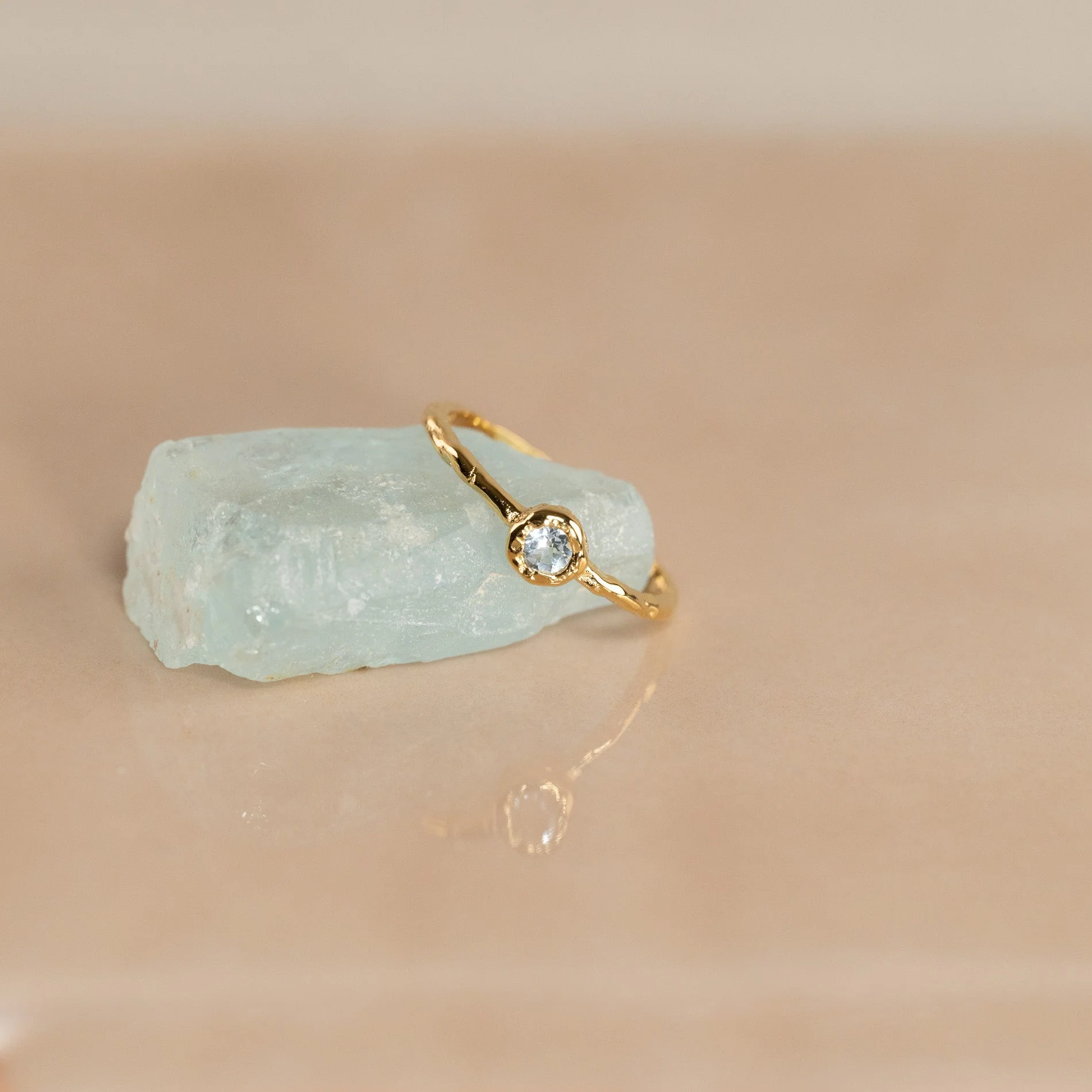 SELENE BLUE TOPAZ GOLDEN RING
