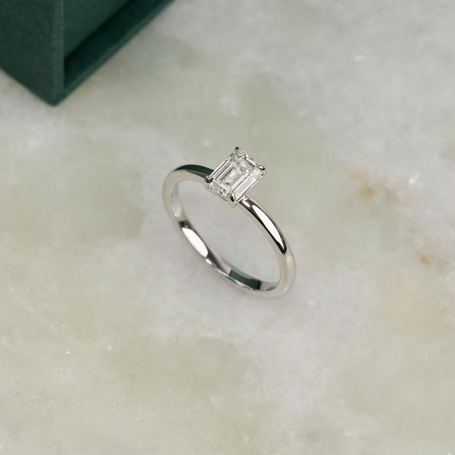 SOLITAIRE EMERALD-CUT DIAMOND RING