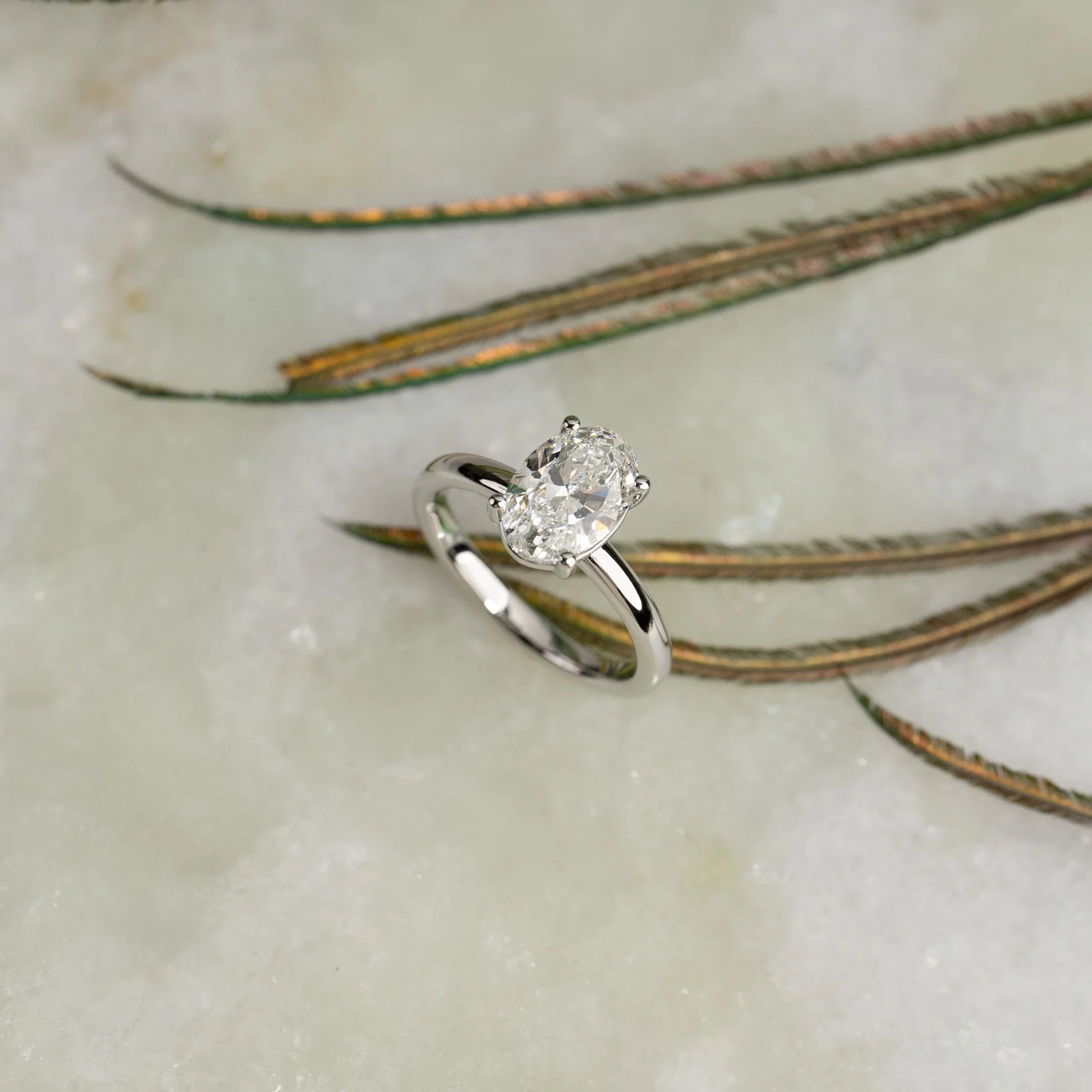 SOLITAIRE OVAL-CUT DIAMOND RING - Image 11