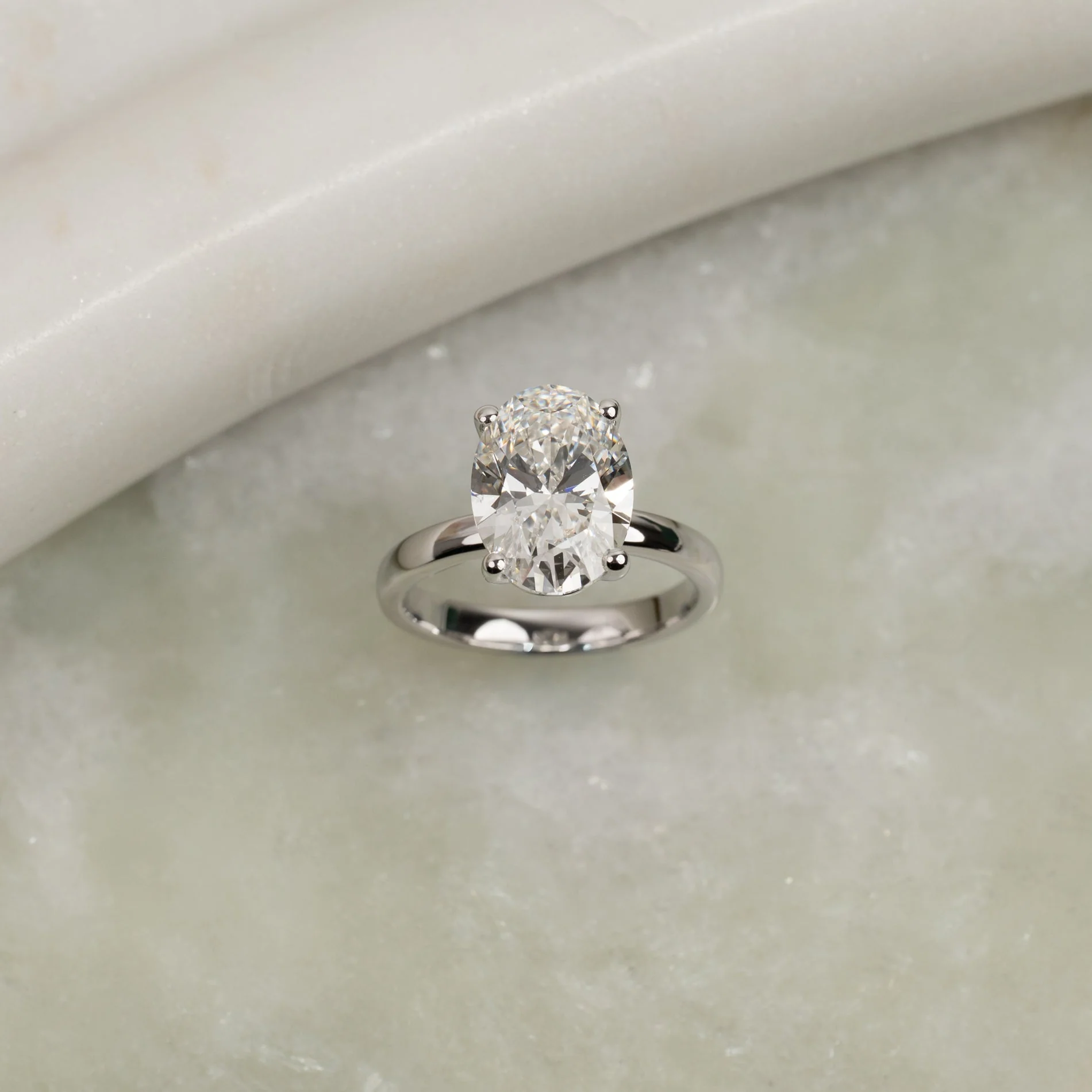 SOLITAIRE OVAL-CUT DIAMOND RING