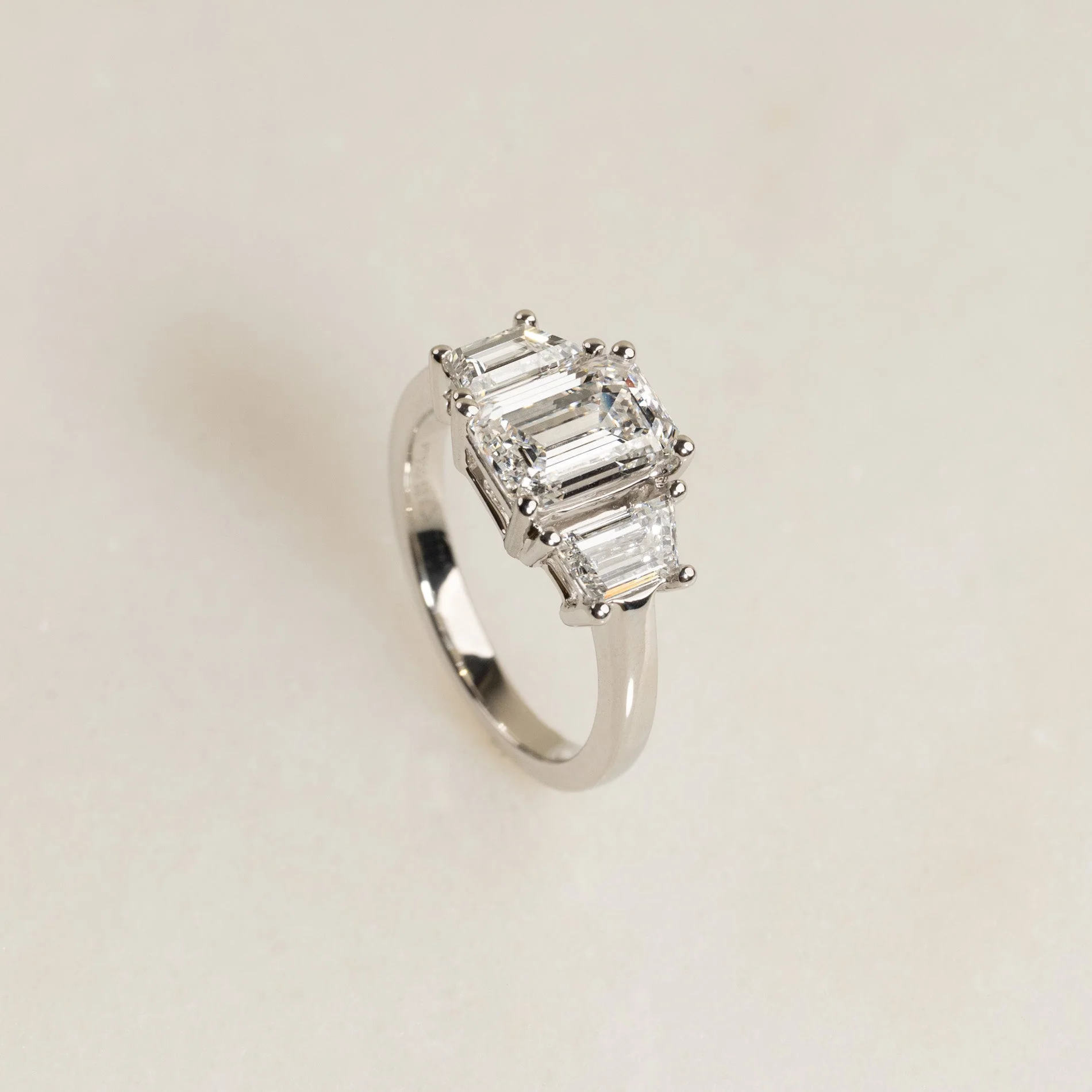 THREE STONE EMERALD-CUT DIAMOND RING - 3.0ct